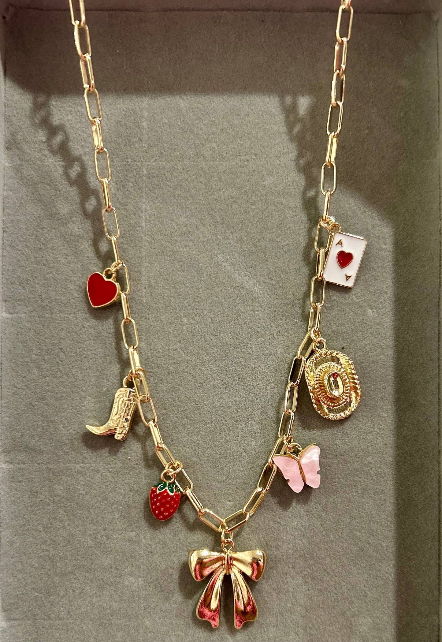 Western charm necklace with 7 charms