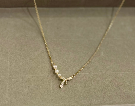 Necklace with three pears and bow