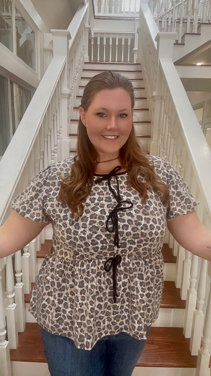 Plus knit leopard babydoll top with ribbon bow tie