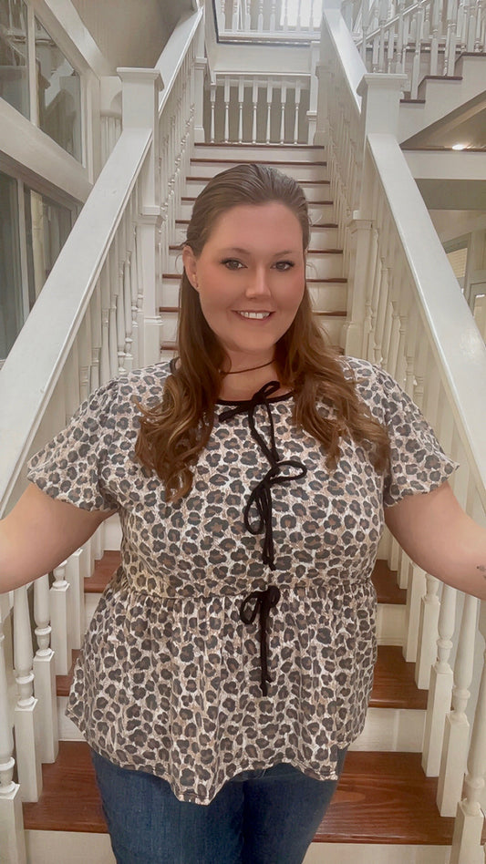 Plus knit leopard babydoll top with ribbon bow tie