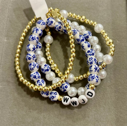 4 piece bracelet bundle with blue china design and WWJD beads