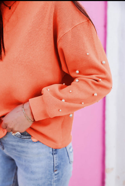 Coral pearl studded sweater