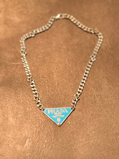 P-R-A-D-A necklace