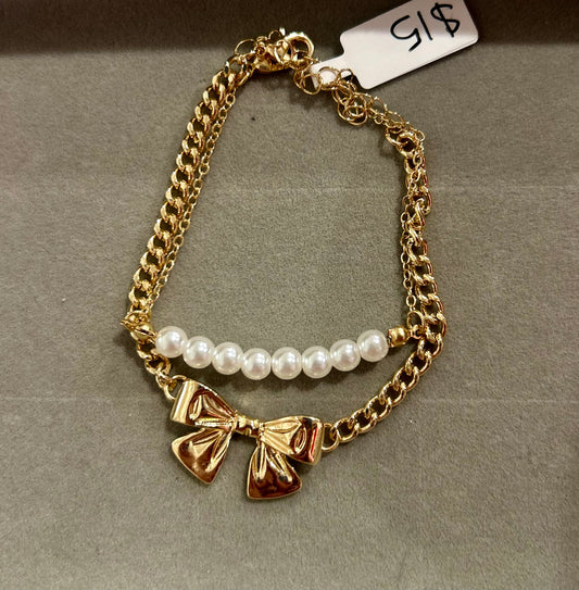 Gold 2 Layer bracelet with bow and pearls