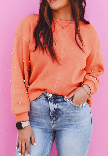 Coral pearl studded sweater