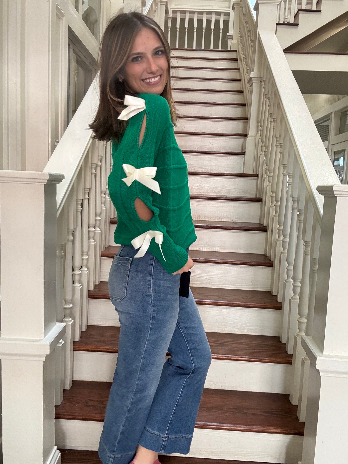 Green Sweater with white bows