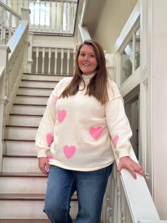 Cream sweater with pink hearts