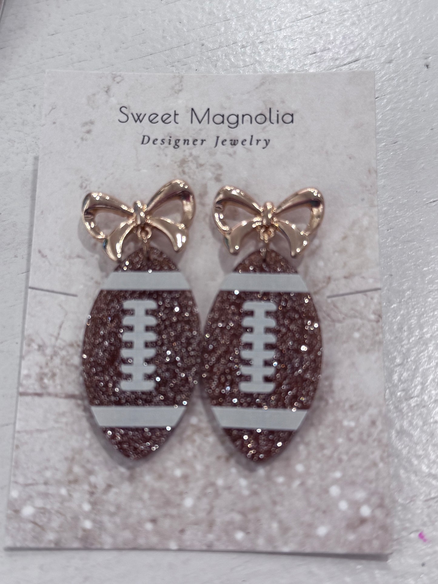 Football bow earrings